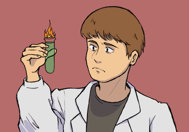 A man in a lab coat handling a glass tube with green, burning liquid.